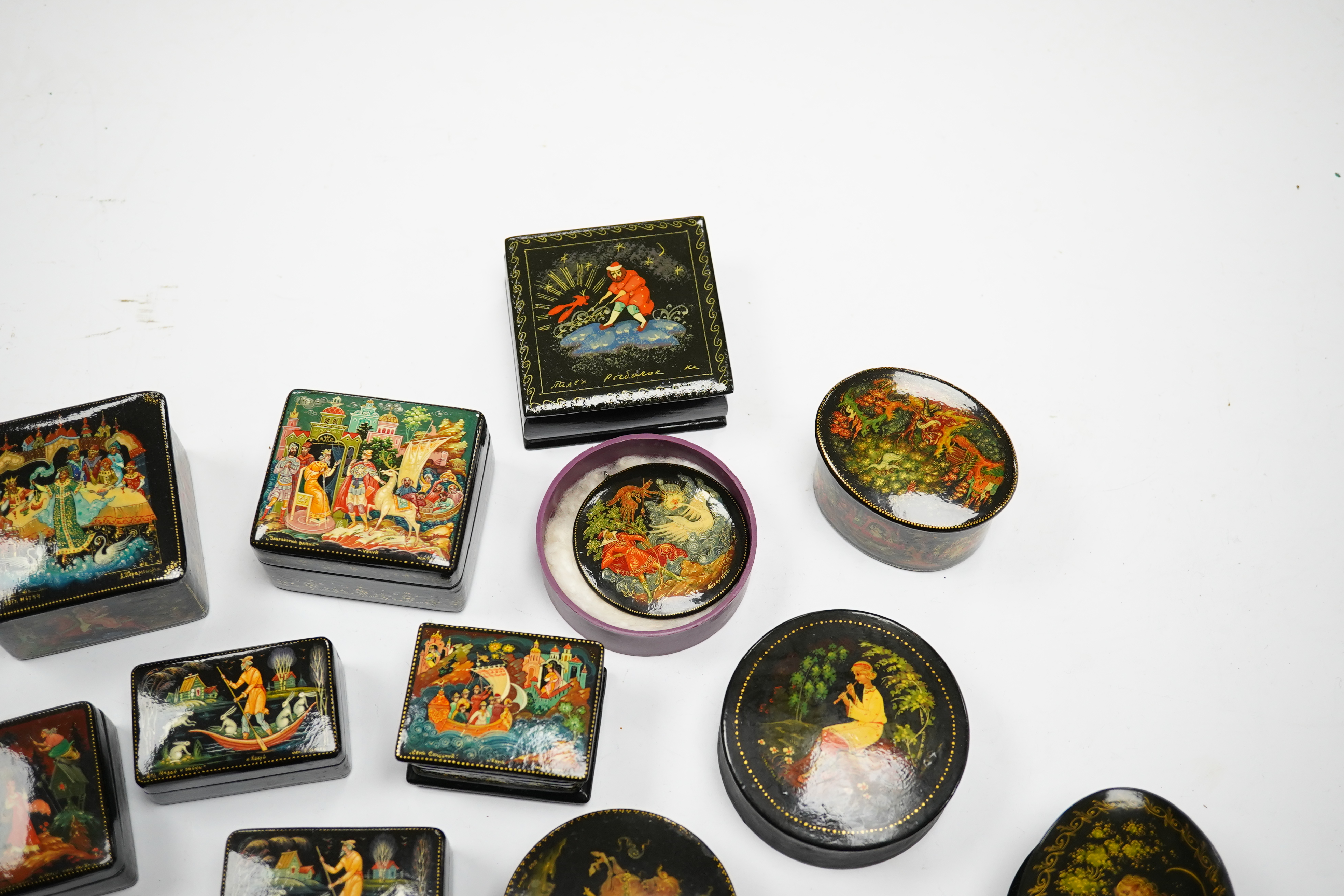 A quantity of late 19th / early 20th century Russian lacquer boxes, largest 9cm. Condition - mostly good